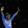 USA's Simone Biles reacts during the apparatus finals at the FIG Artistic Gymnastics World Championships at the Hanns-Martin-Schleyer-Halle in Stuttgart, southern Germany, on October 13, 2019. (Photo by Thomas KIENZLE / AFP)
