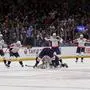 Washington Capitals left wing Alex Ovechkin (8), lower center, is celebrates with is teammates after scoring against New York Islanders during the second period of an NHL hockey game in Elmont, N.Y., Sunday, April 6, 2025. (AP Photo/Adam Hunger)