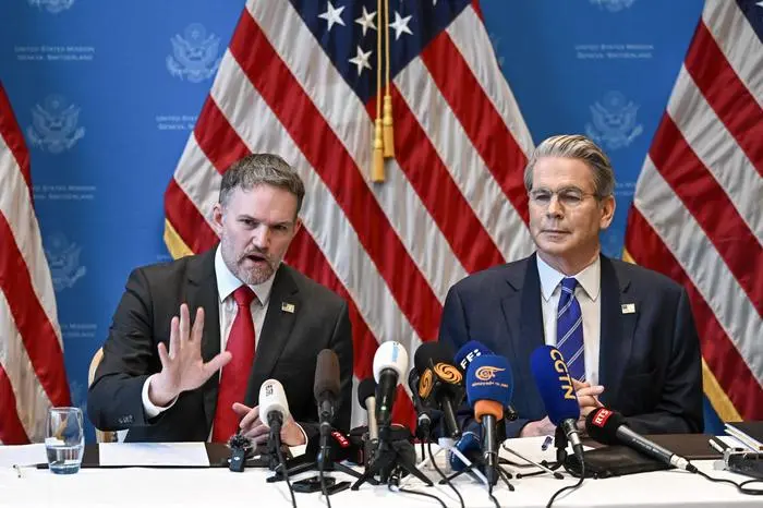(FILES) US Treasury Secretary Scott Bessent (R) and US Trade Representative Jamieson Greer hold a news conference in Geneva on May 12, 2025, to give details of 