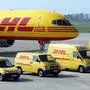**ARCHIV ** Ein Flugzeug sowie Transporter der Deutsche Post Tochter DHL stehen am 30. April 2003 in Berlin am Flughafen. Die Deutsche Post AG kann den britischen Logistikkonzern Exel uebernehmen. Die EU-Kommission in Bruessel gab die Fusion am Donnerstag, 24. Nov. 2005, frei. Damit wird die Post zum weltweit groessten Logistikkonzern. (AP Photo/Roberto Pfeil) ** FILE ** Vehicles and an airplane of German postal company Deutsche Post with the logo of its DHL express mail and logistics branch are presented during a photo call at the airport in Berlin in this April 30, 2003 file picture. EU regulators on Thursday, Nov. 24, 2005 cleared German mail and package delivery firm Deutsche Post to buy British-based Exel PLC for 5.5 billion ($6.48 billion), making it the world's largest global delivery firm.(AP Photo/Roberto Pfeil)