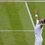 Spain's Rafael Nadal celebrates after beating Taylor Fritz of the US in a men's singles quarterfinal match on day ten of the Wimbledon tennis championships in London, Wednesday, July 6, 2022. (AP Photo/Gerald Herbert)
