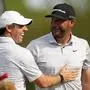 Rory McIlroy, of Northern Ireland, celebrates with Michael Block after Blocks's hole-in-one on the 15th hole during the final round of the PGA Championship golf tournament at Oak Hill Country Club on Sunday, May 21, 2023, in Pittsford, N.Y. (AP Photo/Abbie Parr)