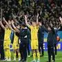 Ukraine's players celebrate after the UEFA's EURO 2024 qualification final play off football match between Ukraine and Iceland, in Wroclaw, Poland, on March 26, 2024. (Photo by Sergei GAPON / AFP)