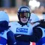 Anna Odine Stroem, of Norway, center, is met by her teammates after her second round jump at the women's ski jumping World Cup competition in Garmisch-Partenkirchen, Germany, Wednesday, Dec. 31, 2025. (AP Photo/Matthias Schrader)