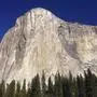 FILE - This Jan. 14, 2015 file photo shows El Capitan in Yosemite National Park, Calif. An elite rock climber has become the first to climb alone to the top of the massive granite wall in Yosemite National Park without ropes or safety gear. National Geographic documented Alex Honnold's historic ascent of El Capitan on Saturday, June 3, 2017, saying the 31-year-old completed the 'free solo' climb Saturday in nearly four hours. (AP Photo/Ben Margot, File)
