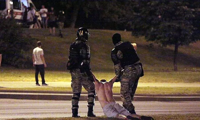 -- AFP PICTURES OF THE YEAR 2020 --

Riot police detain a protester after polls closed in the presidential election, in Minsk on August 9, 2020. (Photo by Siarhei LESKIEC / AFP)