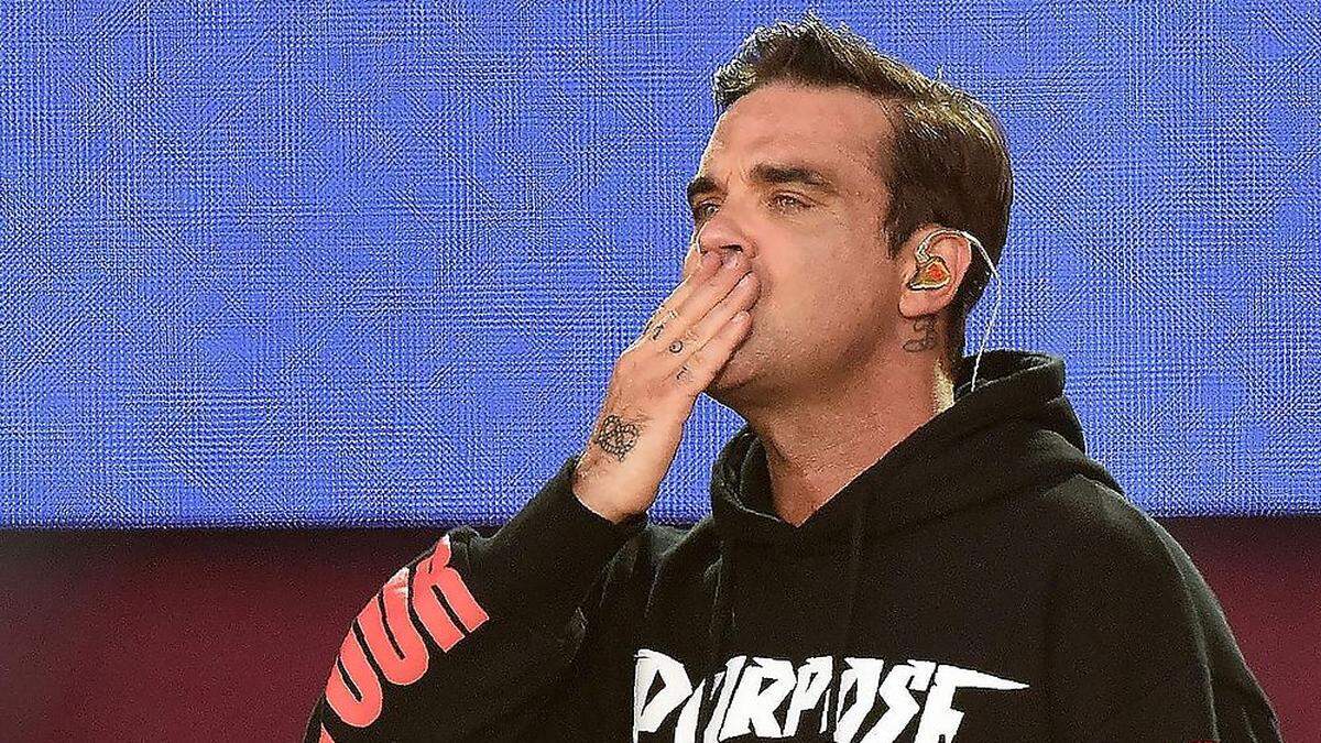 Singt mit Anrainern, anderen Stars und Überlebenden aus dem Grenfell Tower: Popstar Robbie Williams