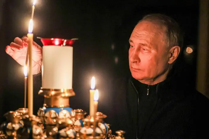 RUSSIA - MARCH 24, 2024: Russia s President Vladimir Putin lights a candle to commemorate victims of a terrorist attack on the Crocus City Hall. Mikhail Metzel/Russian Presidential Press and Information Office/TASS PUBLICATIONxINxGERxAUTxONLY 68503937