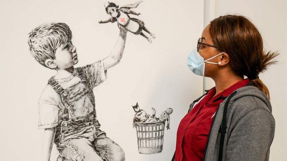 Das Banksy-Gemälde &quot;Helden&quot; erzielte mit rund 20 Millionen Euro einen Rekordpreis