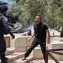 A Palestinian protester argues with Israeli security forces in Jerusalem's Old City on May 10, 2021, as a planned march marking Israel's 1967 takeover of the holy city threatened to further inflame tensions. (Photo by EMMANUEL DUNAND / AFP)