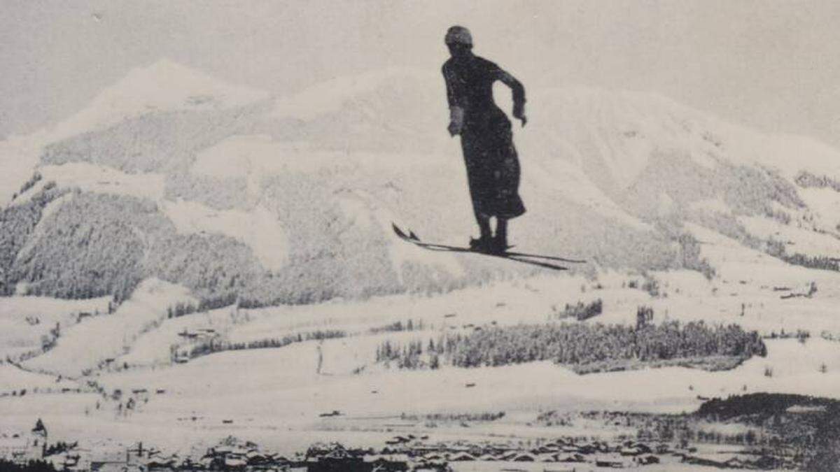 Der Schrei „Ziiiiieh!“ aus Tausenden Kehlen feuert heutzutage die Weitenjäger an. Ob es auch einer Pionierin des Sports geholfen hätte? „Die fliegende Gräfin“ Paula Lamberg setzte 1911 in Kitzbühel bei 22 Metern auf