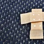 Mit einem Kreuz aus Heftpflaster demonstrierten Evangelische gegen die Karfreitagslösung