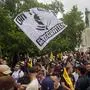 Participants of the farright Identitarian movement take part in a demonstration in Vienna on July 26, 2025. (Photo by Alex HALADA / AFP)