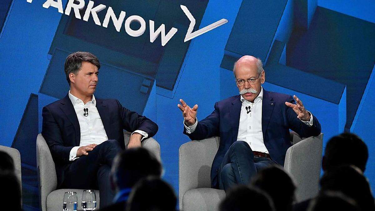 BMW-Chef Harald Krüger und Daimler-Vorstandsvorsitzender Dieter Zetsche präsentieren ihre Pläne