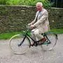 (FILES) In this file photo taken on June 10, 2021 then Britain's Prince Charles, Prince of Wales, cycles on a bicycle as he joins members of the British Asian Trust (BAT) for a short distance as they kick-start BAT's 'Palaces on Wheels' Sponsored Bike Ride, at Highgrove House in Tetbury, Gloucestershire. - Britain's new King Charles III is a committed environmentalist with a long history of campaigning for better conservation, organic farming and tackling climate change, which is likely to sit well with more eco-conscious younger Britons. (Photo by Arthur EDWARDS / POOL / AFP)