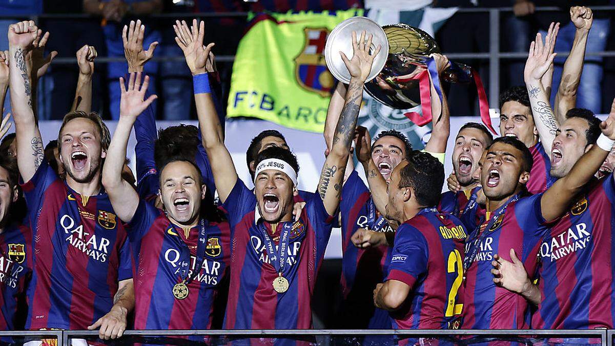 Die Mannschaft des FC Barcelona jubelt über den Champions-League-Sieg