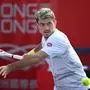 Austria’s Sebastian Ofner hits a return to Spain’s Roberto Bautista Agut during their men's quarter-final singles tennis match at the Hong Kong Open in Hong Kong on January 5, 2024. (Photo by Peter PARKS / AFP)