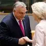 Hungary's Prime Minister Viktor Orban (L) shakes hands with President of the European Commission Ursula von der Leyen prior to the start of a EU leaders Summit at The European Council Building in Brussels on October 26, 2023. EU leaders will debate starting October 26, 2023, in a two day summit in Brussels, for a call for humanitarian "pauses" in Israel's war with Hamas, as the bloc grapples with another conflict on its fringes alongside Russia's invasion of Ukraine. (Photo by Ludovic MARIN / AFP)