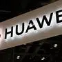 (FILES) This file photo taken on August 2, 2019 shows the Huawei logo at the Consumer Electronics Expo in Beijing. - Chinese telecommunications giant Huawei said on December 31, 2019 that "survival" was its first priority after announcing 2019 sales were expected to fall short of projections as a result of US sanctions. (Photo by Fred DUFOUR / AFP)