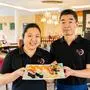 Xiang Yong Wei und Zhan Chong Chong verwöhnen ihre Gäste mit asiatischen Gerichten