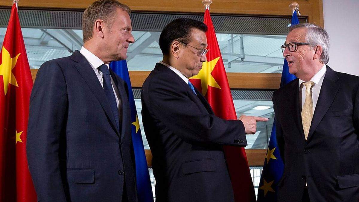 Premier Li mit Tusk und Juncker