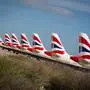 British Airways passenger planes are parked at Palma de Mallorca airport on January 21, 2021. - Due to the pandemic travel restrictions, airlines have been forced to ground thousands of planes across Europe. (Photo by JAIME REINA / AFP)