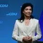 Katherina Reiche, designated German Minister for Economy and Energy, stands on stage during the federal committee meeting of Germany's conservative Christian Democratic Union (CDU) party, on April 28, 2025 in Berlin. The committee will discuss and adopt the coalition agreement negotiated with the social democratic SPD party. The CDU's federal committee is the second highest body of the party – after the party congress. The conservative CDU/CSU alliance has sealed a coalition deal with the centre-left SPD party after winning an election in February 2025, with the new government set to take office on May 6, 2025. (Photo by Tobias SCHWARZ / AFP)