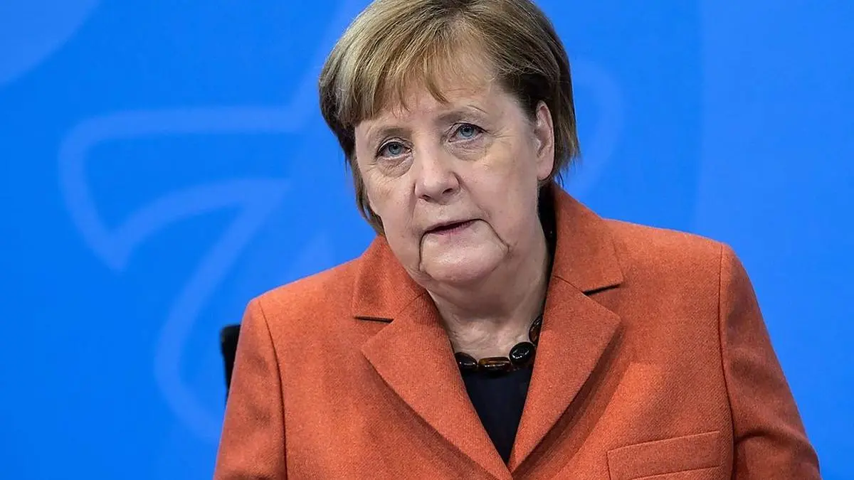 German Chancellor Angela Merkel addresses a press conference following talks via video conference with Germany's state premiers on coronavirus restrictions at the Chancellery in Berlin on December 13, 2020. - Shops selling non-essential goods, hair-salons and schools in Germany will close from December 16, 2020, Chancellor Angela Merkel said, to halt an "exponential growth" in new coronavirus infections in Europe's biggest economy. (Photo by Bernd von Jutrczenka / POOL / AFP)