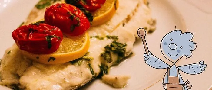 Fisch mit Tomaten (Symbolbild)
