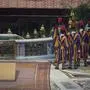Vatican Swiss Guards gather near where the body of Pope Francis will be placed to be given their positions ahead of his arrival into St. Peter's Basilica, at the Vatican, Wednesday, April 23, 2025, where he will lie in state for three days. (AP Photo/Andrew Medichini, Pool)