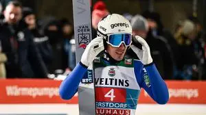 Timi Zajc | Slovenia's Timi Zajc reacts after his second jump of the Men's Individual Large Hill HS137 event of the FIS Ski Jumping World Cup, the first leg of the Four Hills Tournament, in Oberstdorf, southern Germany on December 29, 2025. (Photo by PHILIPP GUELLAND / AFP)