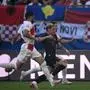 Albania's forward #15 Taulant Seferi (C) and Croatia's defender #22 Josip Juranovic vie for the ball during the UEFA Euro 2024 Group B football match between Croatia and Albania at the Volksparkstadion in Hamburg on June 19, 2024. (Photo by Christophe SIMON / AFP)