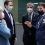 Germany's Federal Chancellor Angela Merkel (L) and Italian Prime Minister Giuseppe Conte(2R) are watched by Austria's Chancellor Sebastian Kurz (2L), Czech Republic's Prime Minister Andrej Babis (3R) and Malta's Prime Minister Robert Abela (R) as they speak while arriving for a roundtable meeting on the first day of a European Union (EU) summit at The European Council Building in Brussels on October 1, 2020. (Photo by Olivier HOSLET / POOL / AFP)