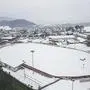 Die verschneite Leichtathletikanlage von oben | Verschneit präsentiert sich derzeit die Lilienberg Arena in Völkermarkt