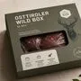 Eine Essensbox mit Wildfleisch gefüllt