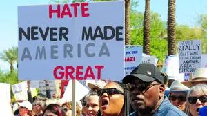 April 5, 2025, Phoenix, Arizona, USA: Protesters gather at the State Capitol for a Hands Off rally, part of a national day of action against Trump administration policies on government downsizing, the economy and human rights. Phoenix joined more than 1,200 demonstrations held nationwide, organized by more than 150 groups opposing efforts by Trump, Elon Musk and wealthy allies to shrink government and roll back public programs. Phoenix USA - ZUMAb270 20250405_znp_b270_023 Copyright: xEduardoxBarrazax