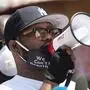 MINNEAPOLIS, MN - JUNE 01: Terrence Floyd (C) speaks to a group gathered at the site where his brother George Floyd was killed by police one week ago on June 1, 2020 in Minneapolis, Minnesota. Floyd called for peace and justice after his brother's death, thanking those who continue to protest and imploring people to cease the damage and destruction which has followed. Stephen Maturen/Getty Images/AFP
