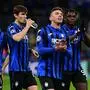 Atalanta's Swiss midfielder Remo Freuler (L), Atalanta's Dutch midfielder Marten de Roon (2ndL) and Atalanta's Colombian forward Duvan Zapata react at the end of the UEFA Champions League round of 16 first leg football match Atalanta Bergamo vs Valencia on February 19, 2020 at the San Siro stadium in Milan. (Photo by Miguel MEDINA / AFP)