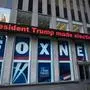 FILE - A headline about President Donald Trump is displayed outside Fox News studios in New York on Nov. 28, 2018. Fox Corp. chairman Rupert Murdoch acknowledged in a deposition that some Fox News commentators endorsed the false allegations by the former president and his allies that the 2020 presidential election was stolen and that he did not step in to stop them from promoting the claims. The documents unsealed Monday, Feb. 27, 2023, are at the heart of a defamation lawsuit against the cable news giant by Dominion Voting Systems. (AP Photo/Mark Lennihan, File)