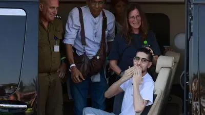 Released Israeli hostage Evyatar David reacts upon arriving at Beilinson Hospital in the Rabin Medical Centre in Petah Tikva in central Israel on October 13, 2025. Israel said that the last 20 living hostages released by Hamas on October 13, had arrived in the country. (Photo by Menahem Kahana / AFP)