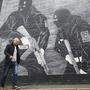 Ein Wand in Belfast erinnert an den Konflikt