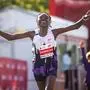 FILE - Ruth Chepngetich, from Kenya, crosses the finish line of the Chicago Marathon to win the women's professional division and break the women's marathon world record in Grant Park on Oct. 13, 2024. (Tess Crowley/Chicago Tribune via AP, file)