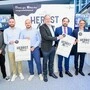 Präsentierten die Grazer Herbstmesse 2023: Lukas Urban (Nintendo), Amar Mulabdić (Eko-Box), Momčilo Stojnić (LED Point), Messe-Leiter Helmut Sechser, Messe-Vorstand Armin Egger, Amin Reyhani (Inhaber Reyhani Teppiche & Reis), Generalmajor Joachim Huber (Stv. Landespolizeikommandant)