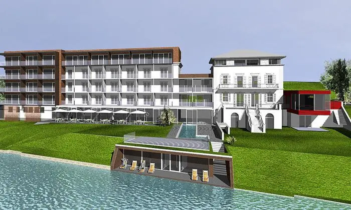 An die denkmalgeschützte Villa (rechts) wird mit viel Glas angebaut 