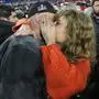 Taylor Swift speaks with Kansas City Chiefs tight end Travis Kelce after an AFC Championship NFL football game against the Baltimore Ravens, Sunday, Jan. 28, 2024, in Baltimore. The Kansas City Chiefs won 17-10. (AP Photo/Julio Cortez)