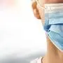 Man face mask cover nose and mouth portrait. Wide banner space for text - coronavirus infection outbreak prevention concept.