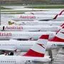 ABD0040_20240328 - SCHWECHAT - ÖSTERREICH: Ein 36-stündiger Streik des Bordpersonals der Austrian Airlines hat in der Nacht auf Donnerstag, 28. März 2024, begonnen und zu ersten Flugausfällen geführt. Im Bild: Geparkte Flugzeuge der AUA am Flughafen Wien-Schwechat. - FOTO: APA/GEORG HOCHMUTH