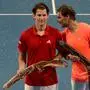 Rafael Nadal (R) of Spain Dominic Thiem of Austria pose for pictures after their men's singles match at the 'A Day at the Drive' exhibition tennis tournament in Adelaide on January 29, 2021. (Photo by Brenton Edwards / AFP)