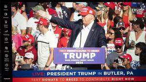July 14, 2024, Butler, Pennsylvania, United States of America: A livestream on Rumble of Donald Trump being struck by gunfire during an assassination attempt was made on his life at a 2024 U.S. Presidential Election campaign rally in Butler Pennsylvania...President Donald Trump was grazed in the ear by a bullet in the from an alleged sniper from outside the MAGA campaign event perimeter from an elevated 1-story building. The U.S. Secret Service is reporting that two political supporters have been killed by gunfire and the alleged assailant was neutralized by law enforcement executive protection counter snipers. Butler United States of America - ZUMAb177 20240714_aap_b177_022 Copyright: xTaidghxBarronx