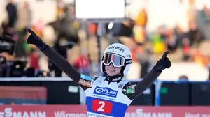 Nika Prevc, of Slovenia, reacts after her second round jump at the women's ski jumping World Cup competition in Garmisch-Partenkirchen, Germany, Wednesday, Dec. 31, 2025. (AP Photo/Matthias Schrader)